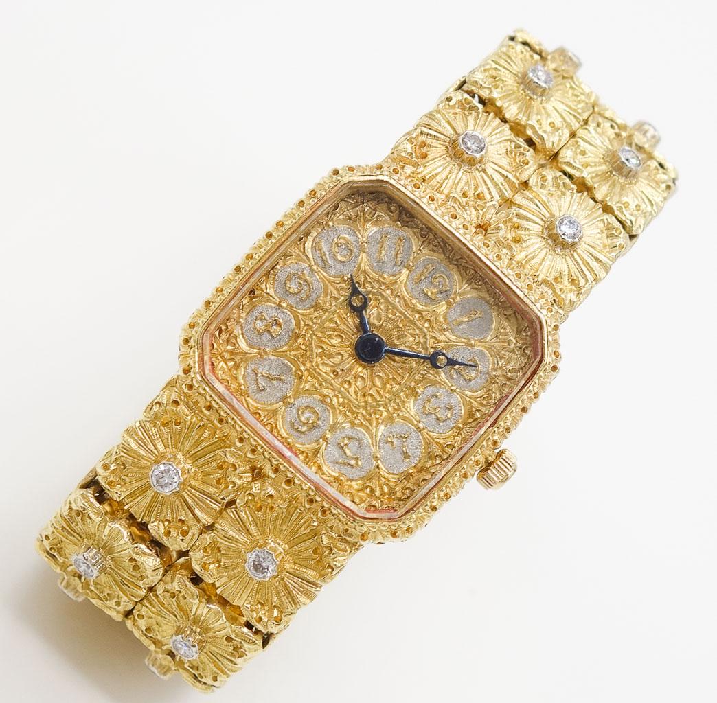 Gianmaria Buccellati 18K Gold Diamond Wristwatch: This is a vintage ladies wristwatch from international luxury jewelry designers Gianmaria Buccellati. Rendered in 18K yellow gold, this slim profile wristwatch features a square case surrounding an en