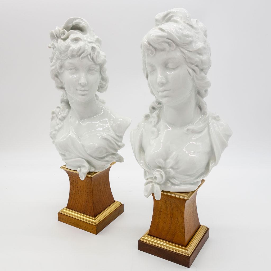 Pair Royal Worcester Night and Day porcelain Busts: This is a pair of porcelain busts by Royal Worcester. Titled Night & Day, these busts were modelled by Arnold Machin. Each is 14 1/2" tall.