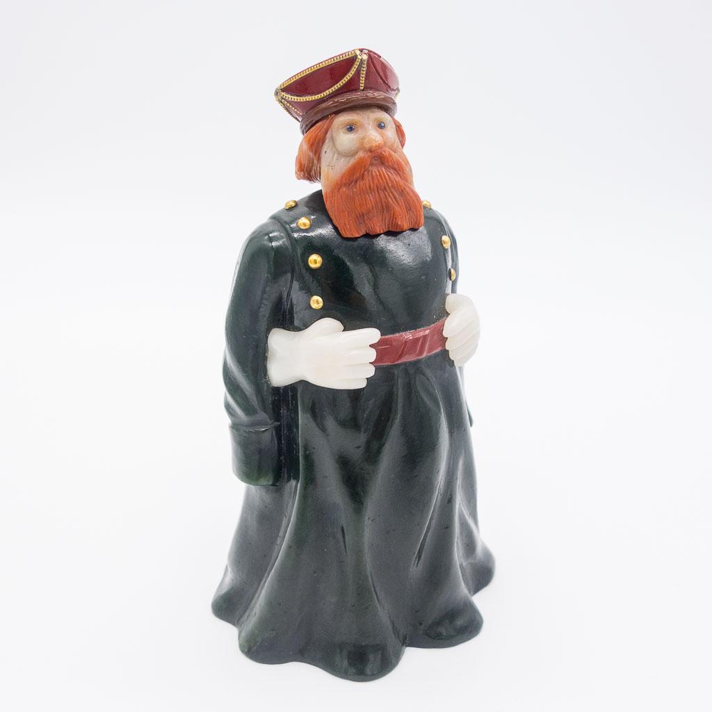Fine Faberge-Style Hardstone Figure of Russian Guard: "Coachman of the Nobility" statuette in the style of Faberge, carved in eosite, nephrite, red jasper, brown obsidian and sapphire. German origin, 5 1/2" tall, Purchased 1977 Garrard & Co. London