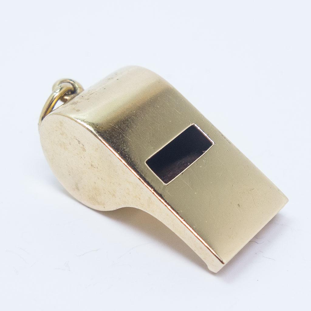 Tiffany 14K Gold Working Whistle Charm Bracelet Charm: A vintage Tiffany & Co. working whistle charm bracelet charm/pendant in 14K gold. It measures 1 x 1/2 x 1/2". It weighs a total of 0.15ozt.