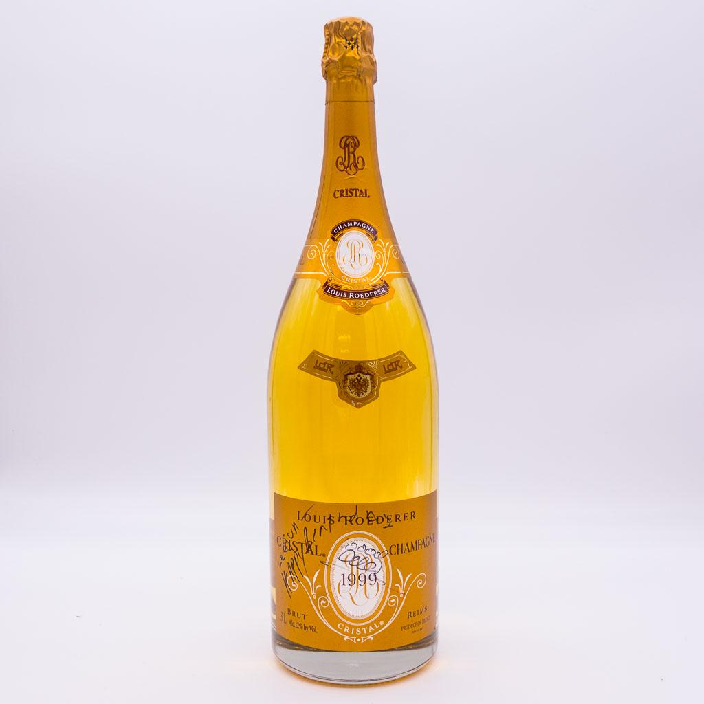 3L Bottle Roederer Cristal Champagne Signed Woody Allen: This is a fine 3 liter bottle of vintage 1999 Roederer Cristal champagne. The cased bottle is inscribed and signed by actor/director/comedian Woody Allen. We guarantee the authenticity of the autograp