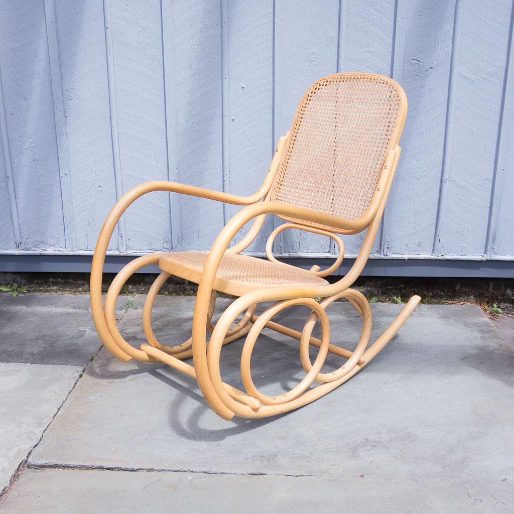 Josef Hoffmann Bentwood Rocking Chair by Stendig: This is a bentwood and cane double circle design rocker with handle by Josef Hoffmann for Stendig. It measures 38 1/2 x 43 x 20".