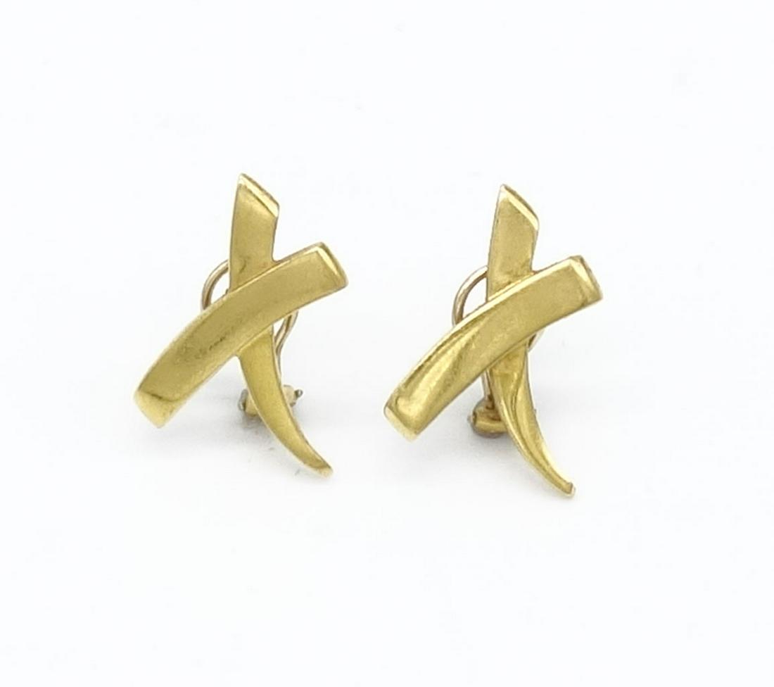 Vintage Paloma Picasso Tiffany 18K Gold Kiss Earrings: This is a pair of earrings from designer Paloma Picasso for Tiffany & Co. circa 1983. Paloma (b.1949) is a French and Spanish fashion designer best known for her jewelry designs for Tiffany & Co. and 