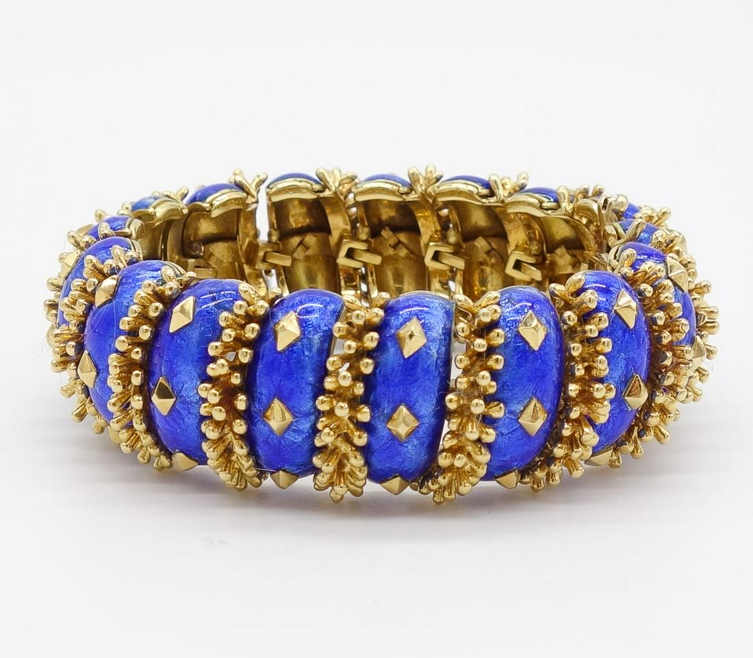 David Webb 18K Gold Blue Enamel Articulated Bracelet: This articulated bracelet by David Webb is made in 18K yellow gold and bright blue enamel with kite shaped designs. Stamped "WEBB". This bracelet is 7.5" long 23.5mm wide, and weighs 102.6dwt.
