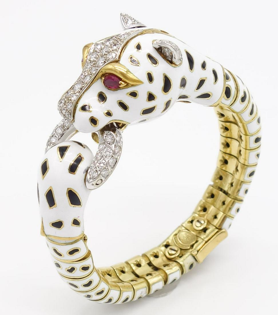 Frascarolo Modele Depose 18K Enamel Leopard Bracelet: This Frascarolo Modele Depose leopard hinged bracelet is set in 18K yellow gold with round brilliant cut diamonds, pear shaped rubies, and white and black enamel. This bracelet is 7.25" long and weigh