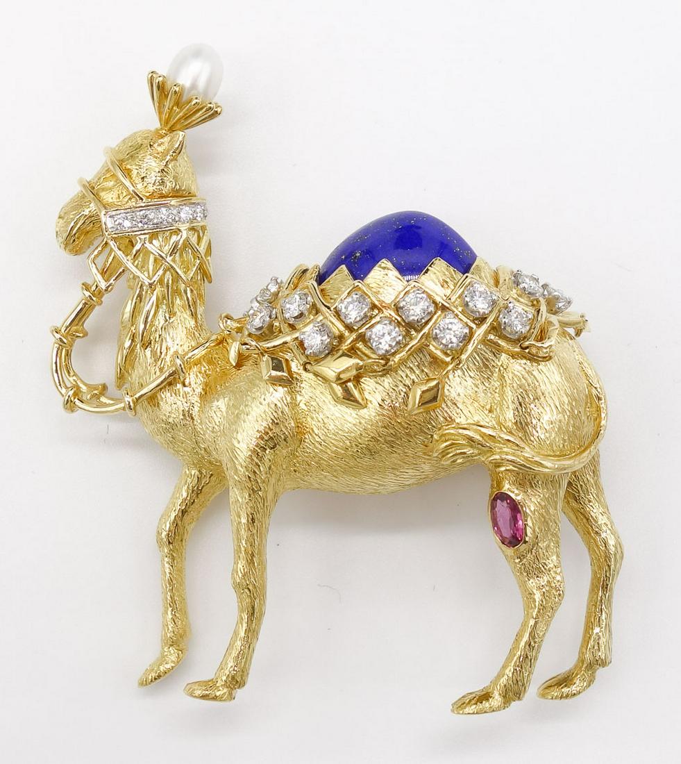 Tiffany Schlumberger 18K Diamond Lapis Camel Brooch: This "Camel" brooch by Jean Schlumberger for Tiffany & Co. is set in 18K yellow gold with round brilliant diamonds, an oval faceted ruby, a lapis cabochon, and a cultured pearl. Accompanied by a Tiffa