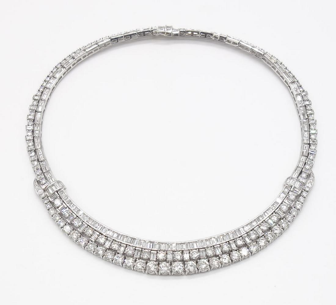 Fabulous Platinum 48.43twt F/VS Diamond Collar Necklace: This platinum and diamond collar necklace features round brilliant and emerald cut diamonds. This necklace is 15" in length, 73.1dwt, 48.43twt of round brilliant and emerald cut diamonds that are F in