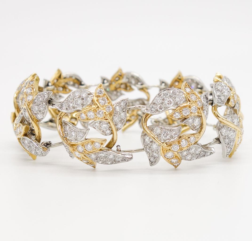 Diamond Leaf Bracelet Schlumberger Tiffany & Co, France: Jean Schlumberger for Tiffany & Co. bracelet composed of a series of foliate links of platinum and 18K gold featuring round brilliant cut diamonds. Accompanied by a Tiffany Schlumberger jewlery box. A