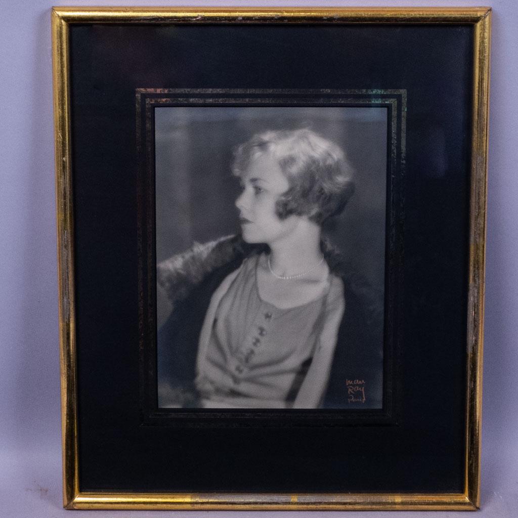 Orig Signed Man Ray Photograph of Young Woman in Furs: This is framed original signed photograph by visual artist Man Ray (American 1890-1976). The photo, taken in Paris, France, features Carolyn Caldwell. Though born in America, Man Ray spent the majorit
