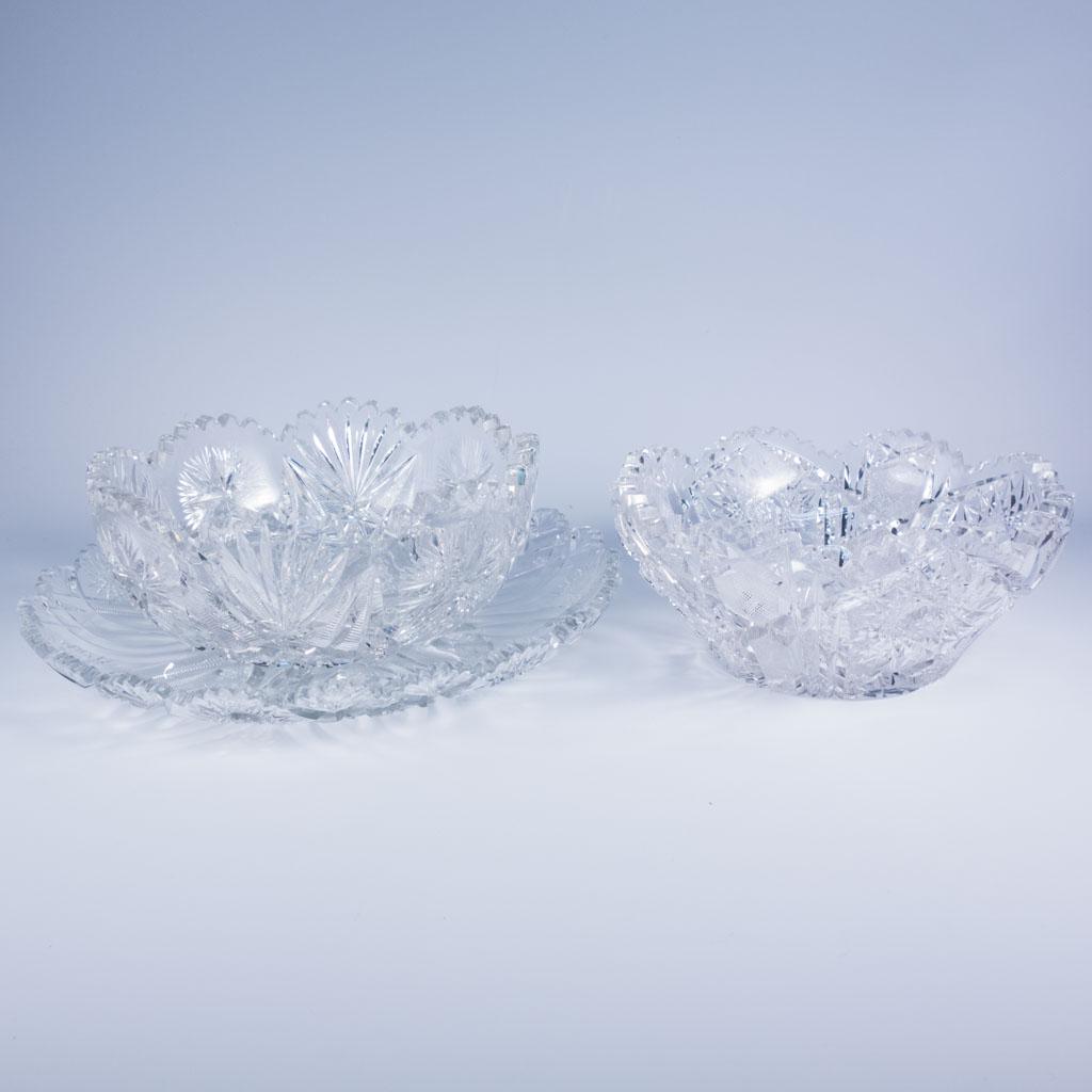2 Antique ABP Cut Glass Bowls and a Platter: A lot of antique American Brilliant Period cut glass bowls and a platter. This includes two cut glass bowls of slightly different star and cross hatched patterns and a similarly patterned serving plat