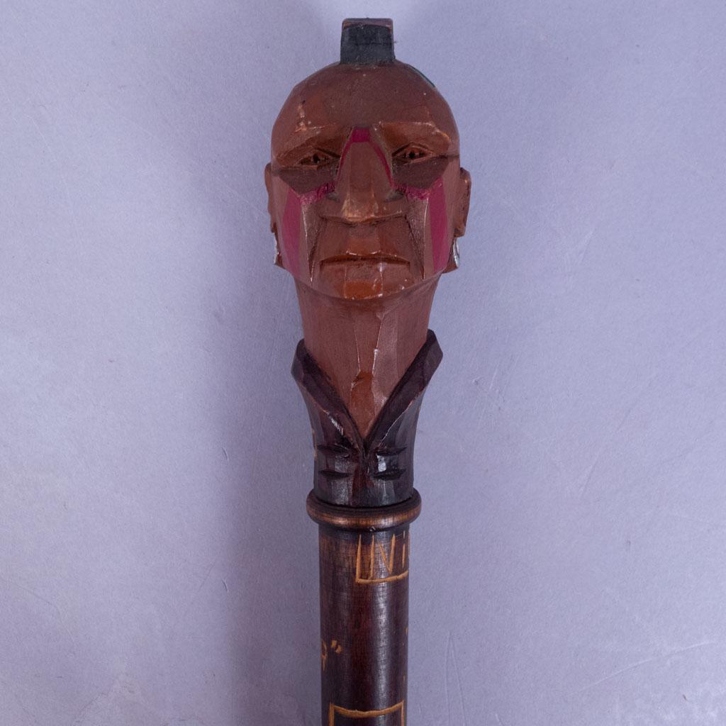 Vintage Dartmouth College Hand Carved Graduation Cane: This is vintage a carved Dartmouth College graduation cane dating to the 1940s. It was the class custom for seniors to carve their names along the length of the cane. Topped with a Native American fin