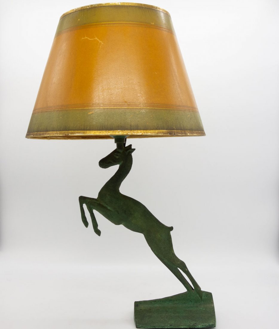 Vintage Art Deco Bronze Horse Lamp w Shade: This vintage Art Deco bronze lamp features a horse rearing up on its hind legs. The lamp is topped with a round gold and green-toned shade. 17" x 9"