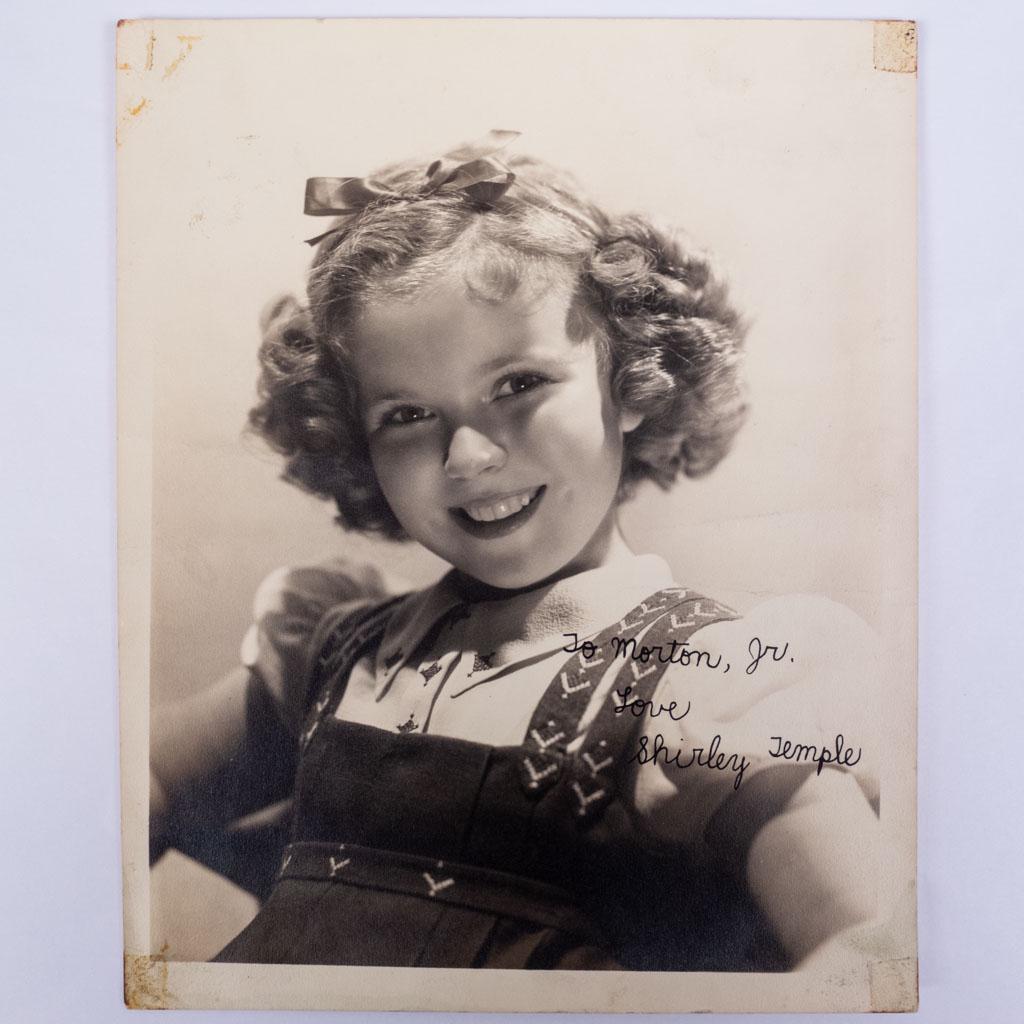 Autograph Signed Portrait Photograph of Shirley Temple: An autographed signed portrait photograph of child actress Shirley Temple. We guarantee the authenticity of all autographs for the lifetime of the buyer. 10 x 8"