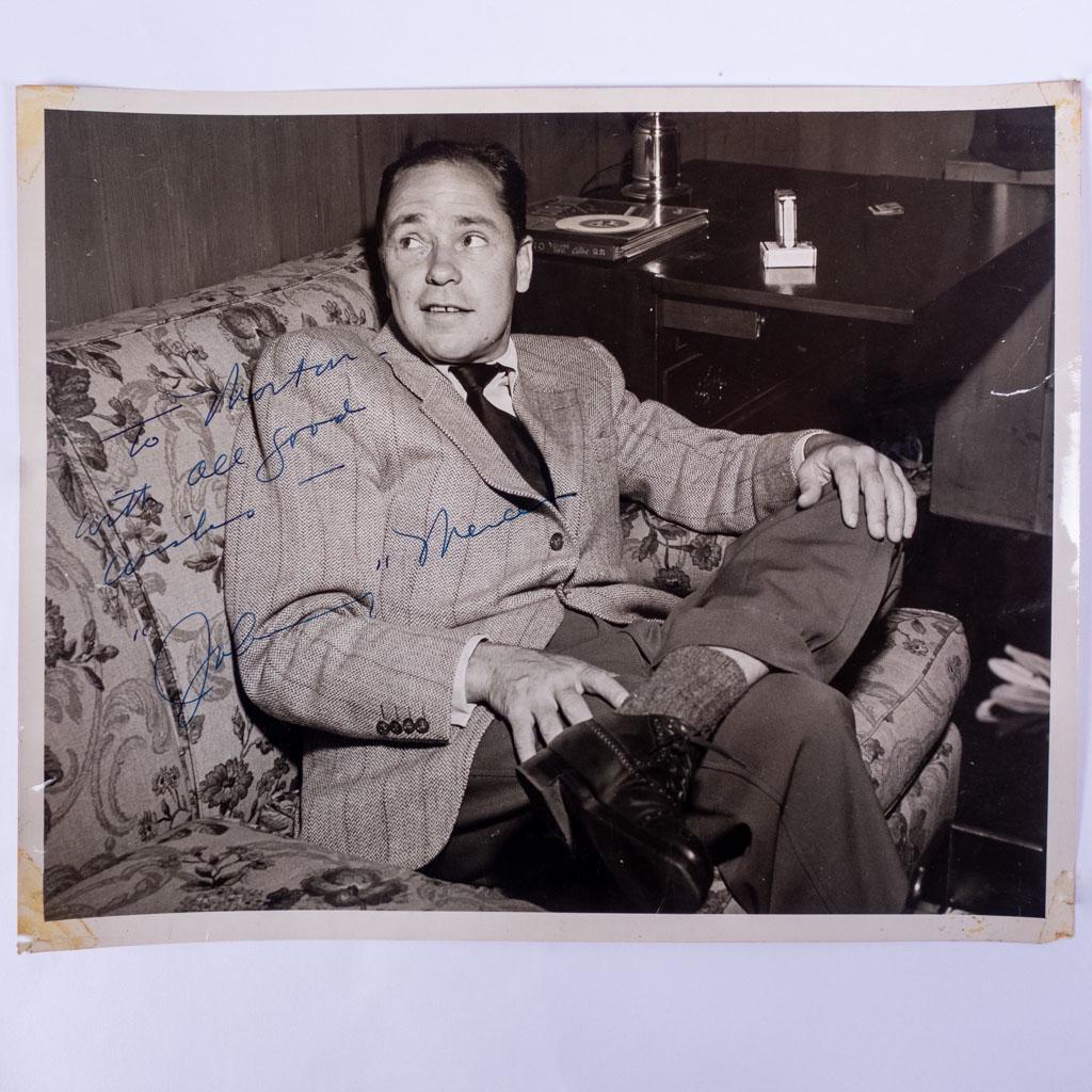 Autographed Signed Photograph Johnny Mercer Songwriter: An autographed photograph of songwriter and four time Oscar winner Johnny Mercer sitting on a couch. We guarantee the authenticity of all autographs for the lifetime of the buyer. 8 x 10"