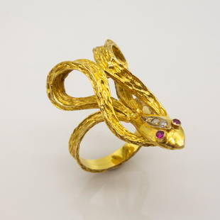 Greek Textured Gold Snake Ring with Ruby and Diamond: This size 7.5 textured snake ring was made in Greece. It features ruby eye and single cut diamond accents set in 18K yellow gold.  Stamped 750 Greece Ring size 7.5, top of ring 32mm, weight 4.7dwt, ru