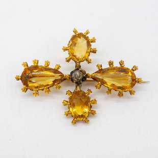 Antique 14K Citrine Rose Cut Diamond Brooch Pin: This is an antique brooch pin rendered in fine 14K gold and set with four citrine gemstones and a rose cut diamond at the center. Dimensions: 1 7/8 x 1 1/2". Weight: 8.7g. Citrine Dimensions: 9.2 x