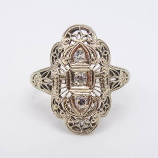 Antique Art Deco 14K White Gold Filigree Diamond Ring: This is an antique ladies ring dating to the 1920s. Rendered in fine 14K white gold, this Art Deco filigree ring features three single cut diamonds. SI clarity, GH color. Size: 5.25 US. Weight:2.9g. F