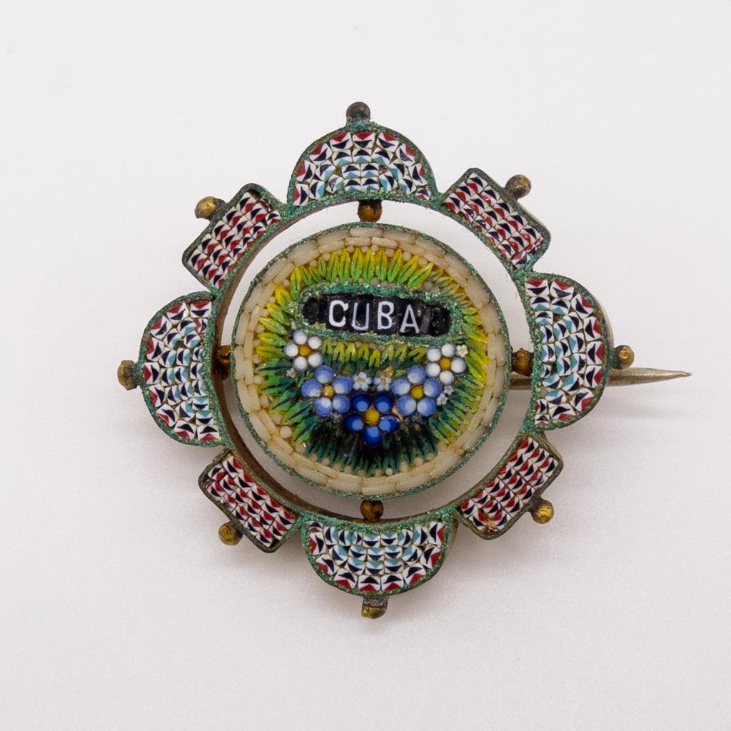 19th Century Micromosaic Cuban Souvenir Brooch: This antique Italian-style micromosaic brooch is a souvenir of Cuba with floral motifs. 13 1/2" Diameter, weighs 3.5dwt.