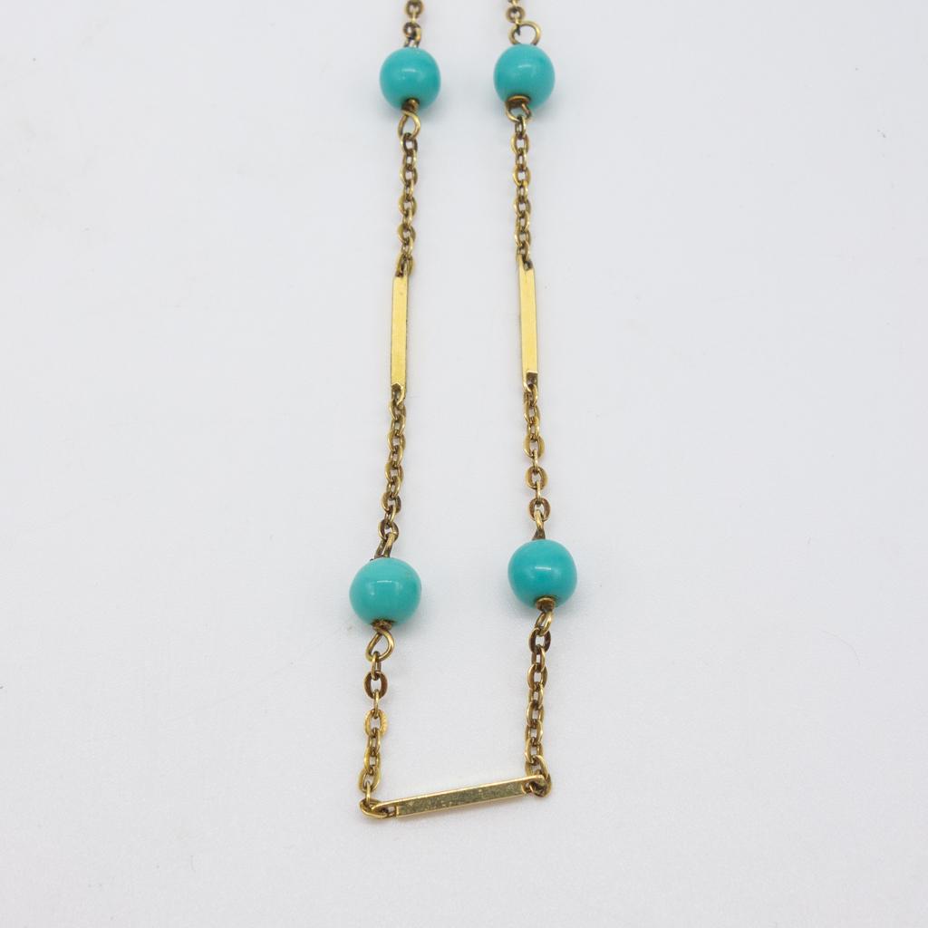 Vintage Italian 14K Turquoise UnoAErre Necklace 15": This is a vintage and unusual UnoAErre Italian 14K yellow gold choker necklace set with eight turquoise beads. Length: 15". Weight: 4.5g. Turquoise Dimensions: 4.8mm.
