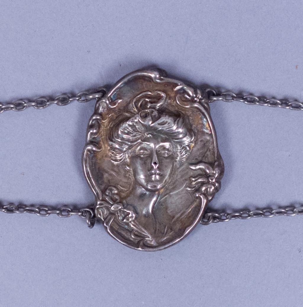 Art Nouveau Gibson Girl Sterling Silver Belt Parts: This is a charming Gibson Girl motif lot of belt parts dating to around the turn of the century. Rendered in fine sterling silver. The central part of the belt is 14" long x 2 1/8" wide max. The two s