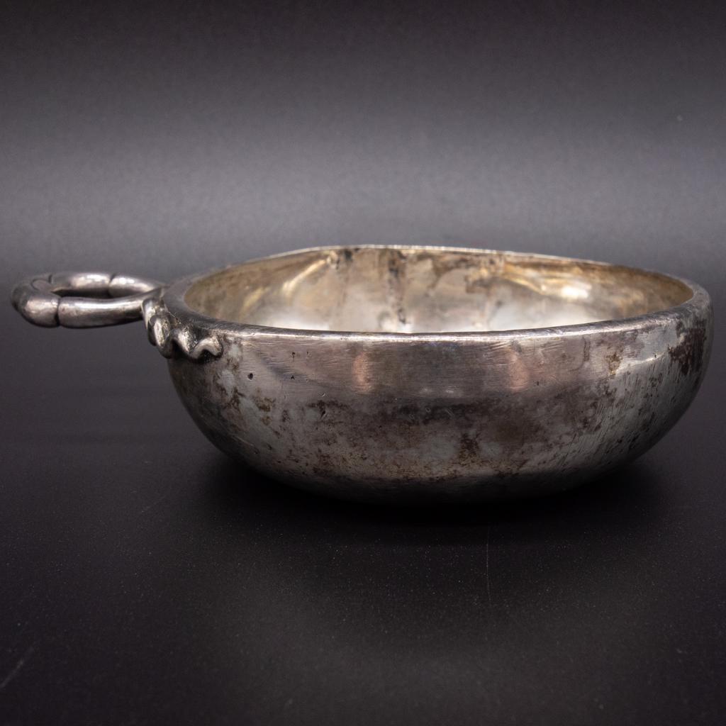 Antique Continental Silver Snake Motif Wine Tastevin: This is an antique Continental silver (likely French) tastevin featuring a snake motif at the handle. 3 3/8" diameter. It weighs 3.7ozt.