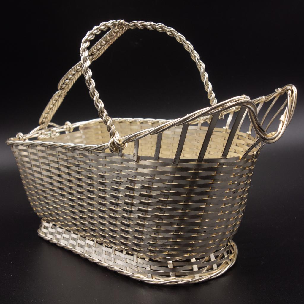 Christofle Gallia France Silver SP Wine Basket: This is a vintage Christofle silverplated wine caddy woven basket. Marked Gallia France. From the estate of Mrs. Charles R. Wood of Glens Falls, New York. Charles Wood, an entrepreneur and philanthrop