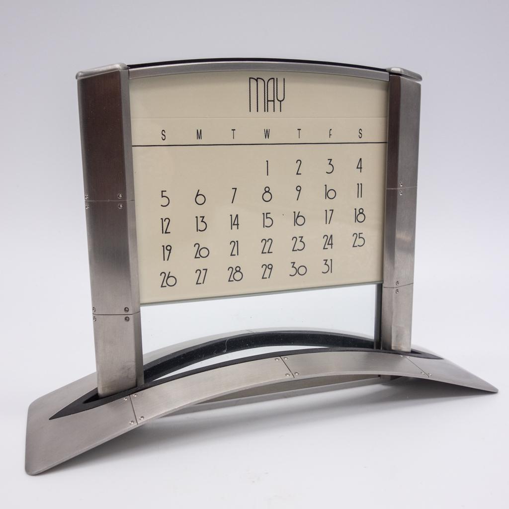 Tiffany & Co Swiss Perpetual Desk Calendar: This is a vintage Tiffany & Co perpetual desk calendar. From the estate of Mrs. Charles R. Wood of Glens Falls, New York. Charles Wood, an entrepreneur and philanthropist, founded the Great Escape the
