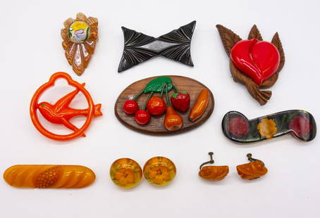 Vintage Bakelite Brooches Earrings incl Reverse Carved: This is a vintage lot of Bakelite brooches and earrings including reverse carved and painted. The wooden brooch with multiple fruits is 3 1/8 x 2". The total weight of the lot is 128g