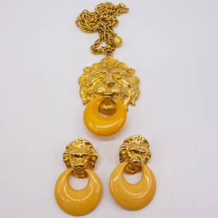 Kenneth J Lane Lion Head Door Knocker Necklace Earrings: This is a vintage lion head door knocker style necklace and clip earrings suite from American jewelry designer Kenny Jay Lane (KJL). The necklace chain length is 18" and the pendant is 3 3/4 x 2