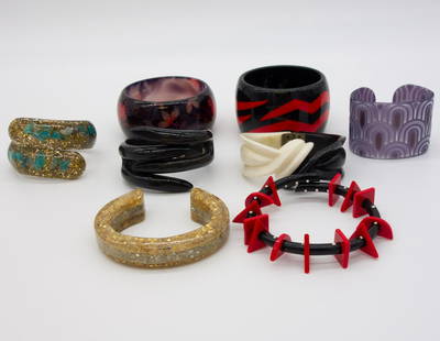 Group 8 Vintage Mid Century Lucite and Other Bracelets: This is a vintage group of eight Mid Century bracelets including lucite and plastic. The interior circumference of the floral bangle is 8 1/4" and the width is 1 1/2"