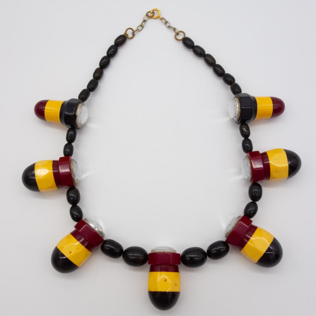 Unusual 1940s Bakelite Bombshell Motif Necklace (1 of 1)