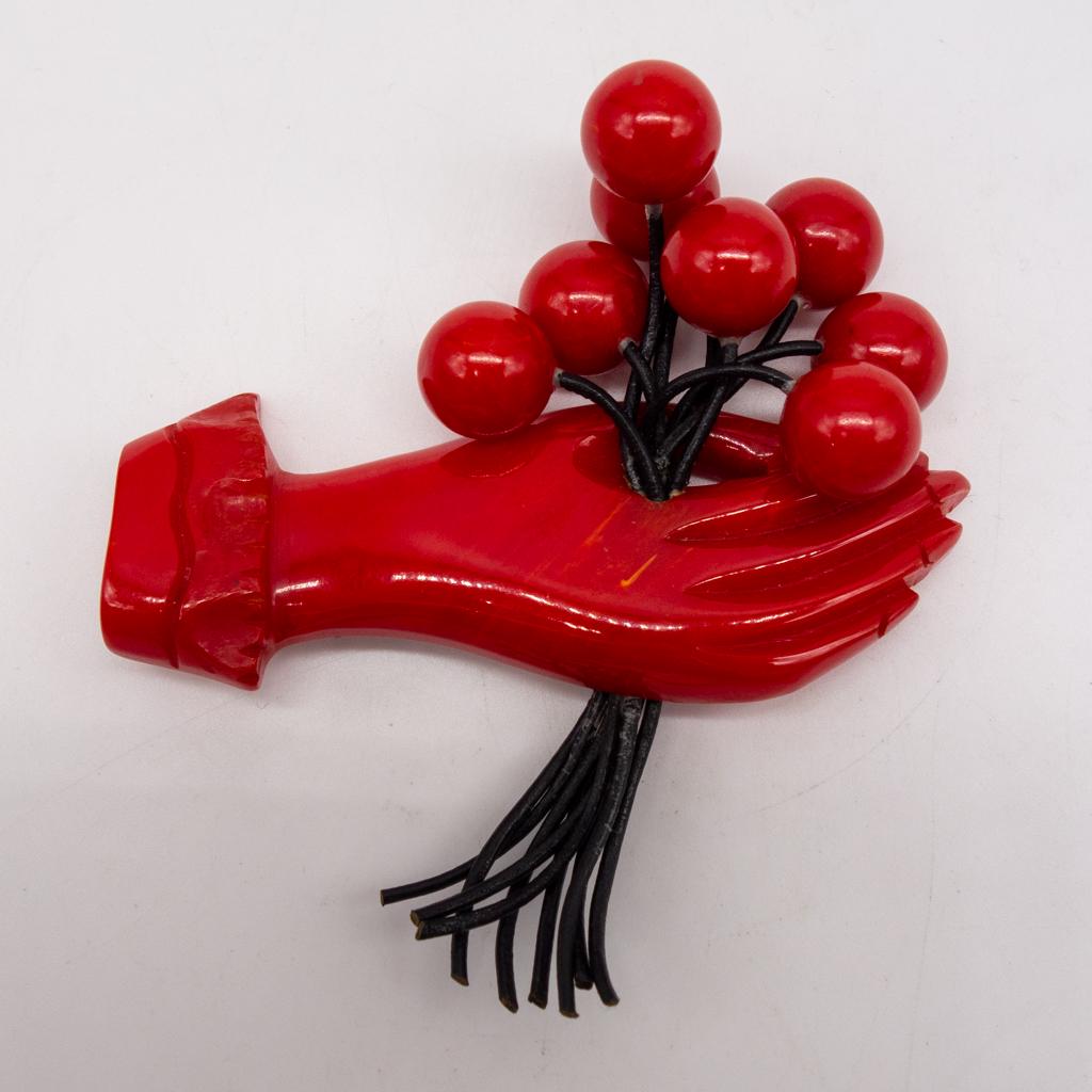 Vintage Red Bakelite Hand Holding Cherries Brooch (1 of 2)