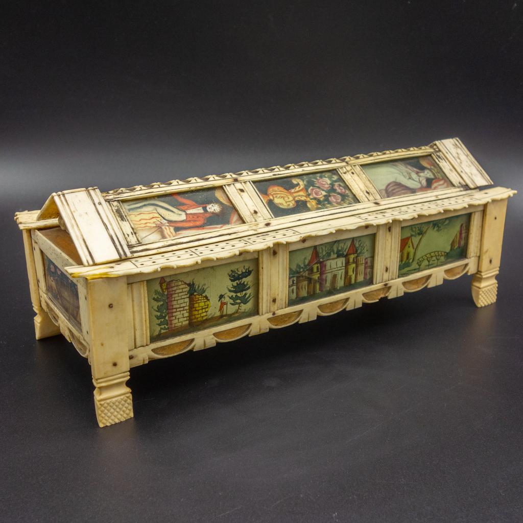 Antique Unusual Continental Hand Painted Cribbage Box: This antique Continental carved bovine bone cribbage box featuring hand painted scenes along the paneled sides. 9 5/8 x 4 x 3.5"