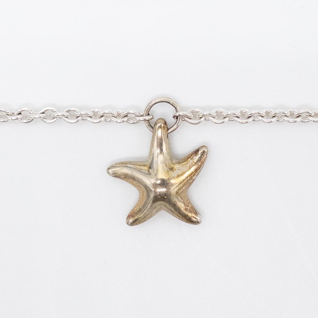 Elsa Peretti Tiffany Sterling Silver Starfish Bracelet: This is a vintage starfish charm bracelet designed by Elsa Peretti for Tiffany & Company. The bracelet length is 7". The charm is 1/2 x 1/2". It weighs 3.2g.