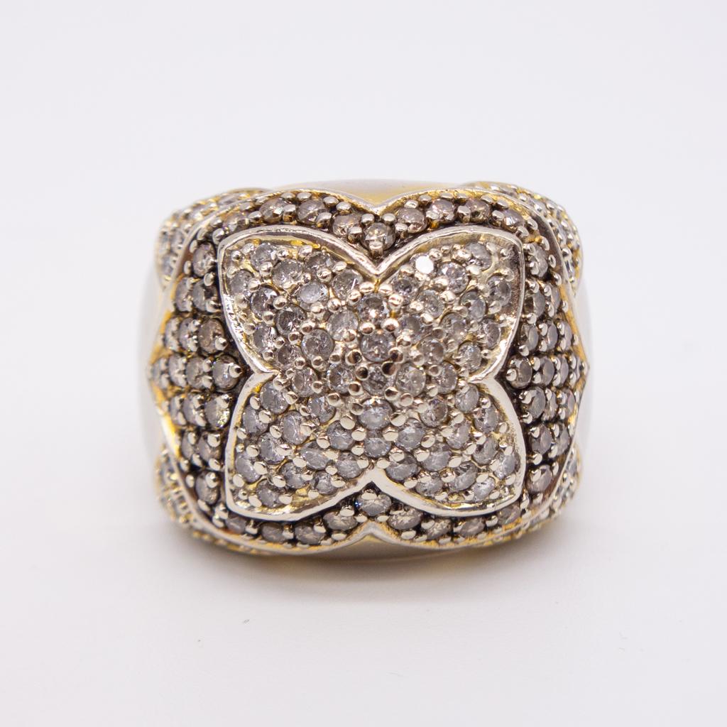 Vintage EFFY Bita 14K White Gold Diamond Ring: This is a vintage 14K white gold Bita ring from EFFY. The dome style ring is studded with full cut diamonds. SI-I clarity and HI-champagne color. The ring is a size 6.75 US and it weighs 13.4g.