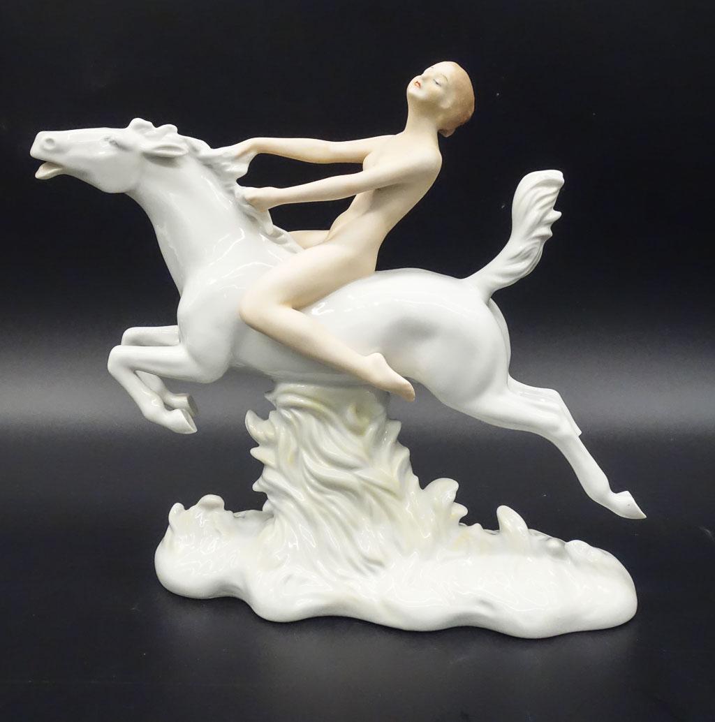 Antique Hungarian Herend Art Deco Porcelain Figure of Nude on Horseback: This is an antique Art Deco porcelain figurine of a nude riding on horseback made by Herend of Hungary. 9 x 9 x 2 3/4"