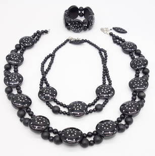 Vintage Black Polka Dot Necklaces Bracelet Suite: This is a vintage black bead with silver Polka Dot double necklace and bracelet suite. The longest necklace is 28" max. The shorter necklace is 16". The bracelet is elastic expandable. 