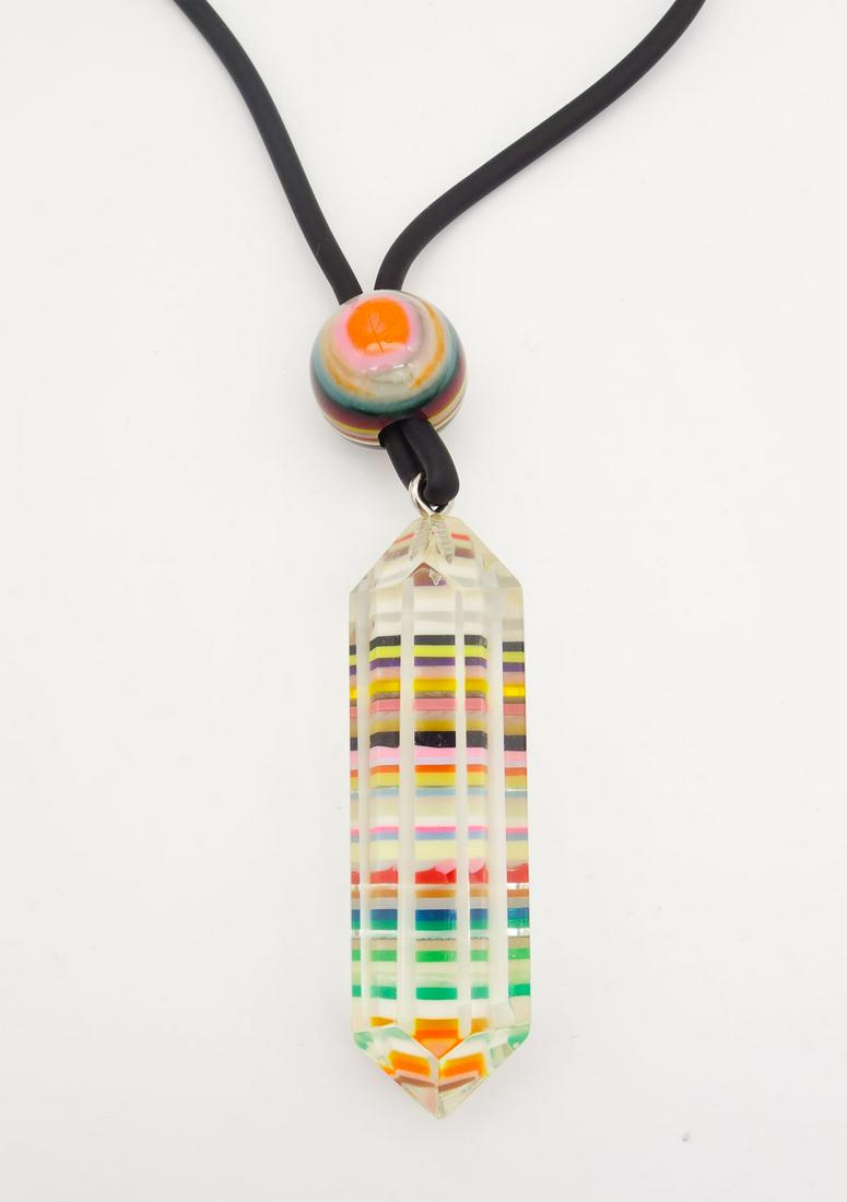Sobral Pop Art Clear Resin Rainbow Striped Prism Lariat Style Necklace: This is a vintage clear resin lariat style pendant necklace from Brazilian designer Carlos Sobral. The prism is accented with a colorful stripes and adjustable bead. The necklace length is 28". The pe