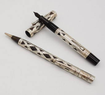 Vintage Lot 2 Watermans Silver Overlay #403 Fountain and Mechanical Pencil Set: This is a vintage fountain pen and mechanical pencil set from Waterman. Each exhibits an engraved silver overlay. The pen is numbered 403 and the "Ideal" nib is marked as 14K gold. The lead in the