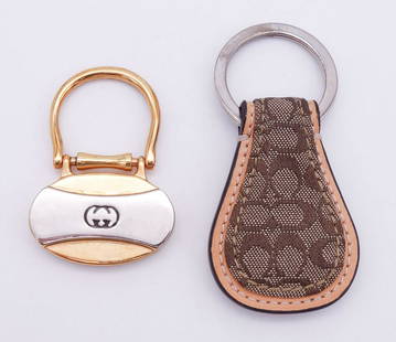 Vintage Designer Coach and Gucci Key Rings: This is a vintage lot of two designer key rings from Coach and Gucci. The Gucci fob is 2 1/4" long and the Chanel fob is 1 1/2". 