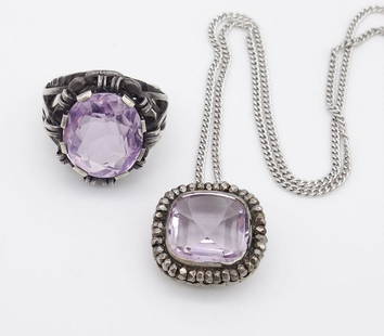 Vintage Sterling Silver Amethyst Pendant Necklace and Ring: This is a vintage sterling silver pendant necklace and ring each featuring a large faceted amethyst gemstone. The necklace chain is 18" and the pendant is 5/8 x 5/8". The ring is a size 4.75US and