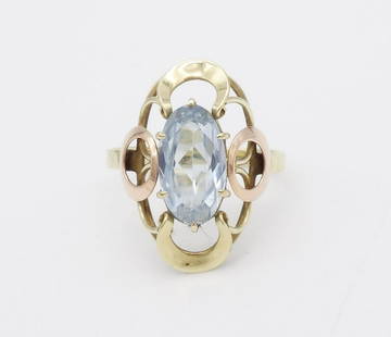 Vintage 14K Gold Ornate Filigree Aquamarine Ring Size 10: This is a vintage 14K gold ladies ring featuring an ornate looping filigree setting holding a large oval faceted aquamarine gemstone. The ring is a size 10US and it weighs a total of 4.2g. The ring fa