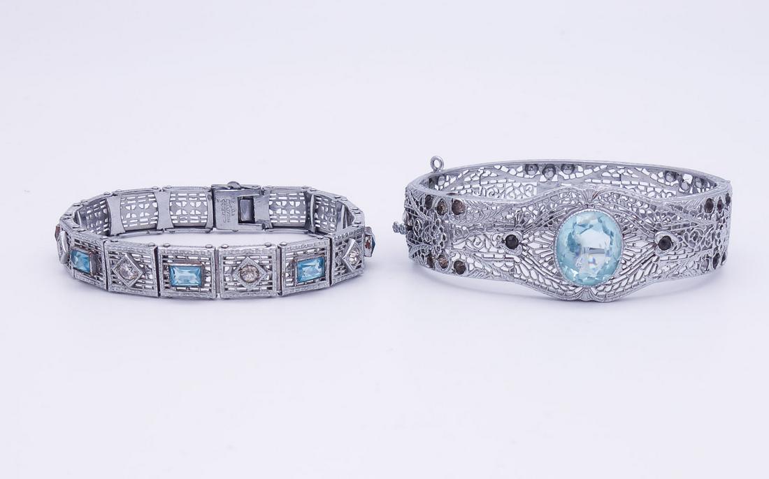Antique Lot of 2 White Gold GP Art Deco Filigree Jeweled Bracelets: This is an antique lot of two white gold plated filigree Art Deco bracelets featuring jeweled accents. The hinged bracelet has an interior circumference of 6 1/2" and the width is 7/8". The other brac