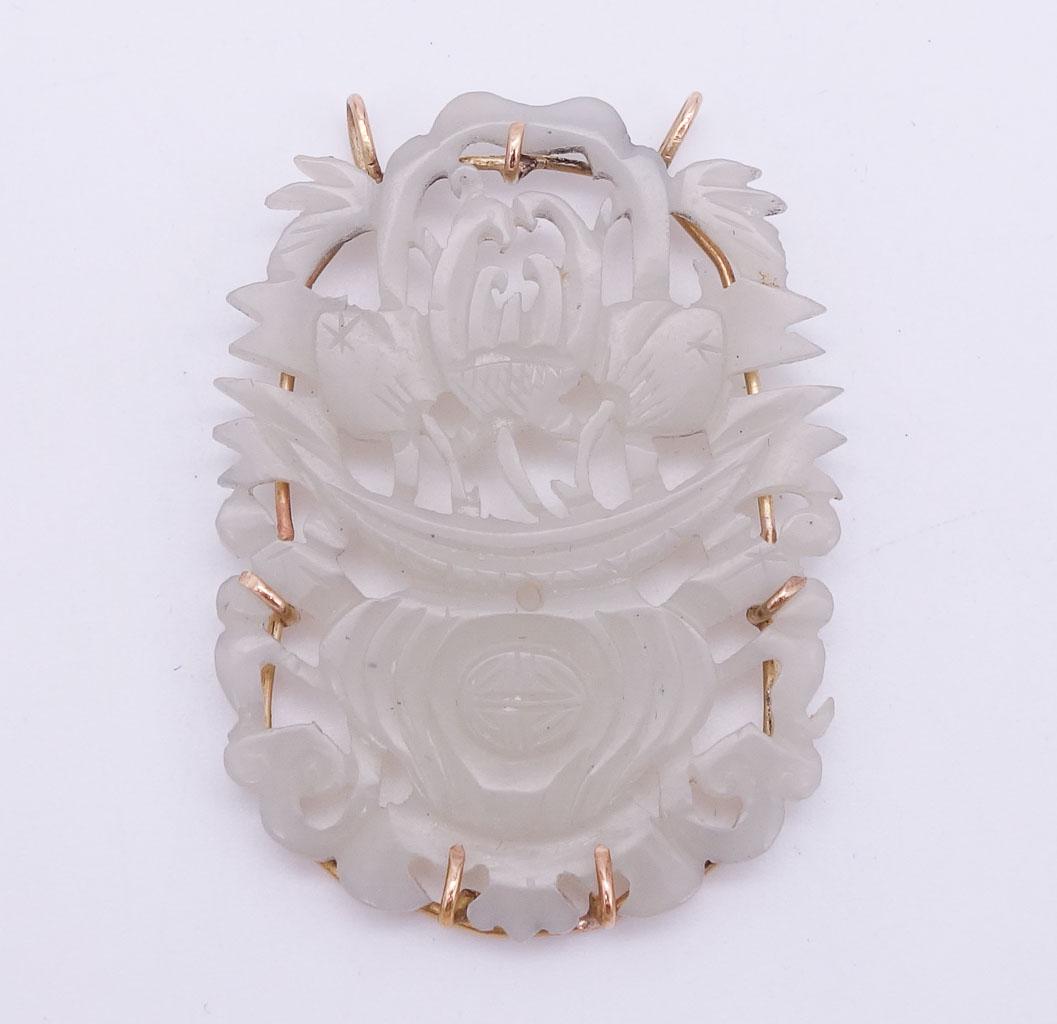Vintage 14K Gold Carved Celadon Jade Chinese Necklace Pendant: This is a vintage Chinese 14K gold carved celadon jadeite necklace pendant. 1 7/8 x 1 3/8". It weighs 6.6g.