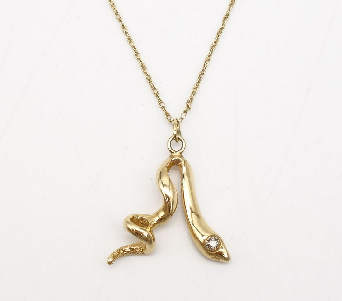 Vintage 14K Gold Snake Diamond Pendant Necklace: This is a vintage 14K yellow gold necklace with a snake pendant with a single cut diamond accent. The chain length is 18". The pendant is 1 x 7/8". The total weight is 3.5g.