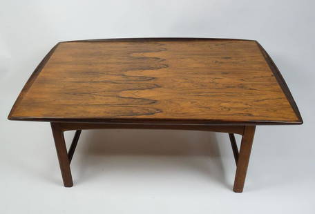 Swedish Mid Century Modern MCM Folke Ohlsson Frisco Rosewood Coffee Table: This is a "Frisco" rosewood coffee table designed by Swedish mid century designer Folke Ohlsson for the Bra Bohag series manufactured by Tingstroms in the 1960s in Sweden. 48 x 32 x 17 1/2"