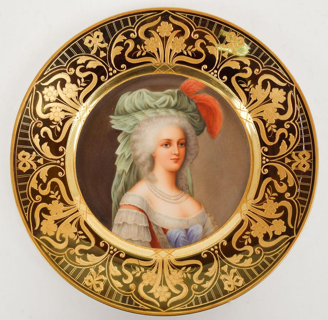 Antique Royal Vienna Porcelain Gilded Portrait Plate "Marie Antoinette" Signed Wagner: This is an antique Royal Vienna porcelain gilded plate hand painted with a portrait of Marie Antoinette. Artist signed: Wagner. Marked on the reverse: "Marie Antoinette". Blue beehive maker's mark. 10