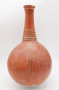 Ancient Red Incised Polychrome Painted Pottery Long Neck Rounded Body Vessel: This is an ancient red long neck pottery vessel with a rounded body. The vessel is decorated with incised circles around the neck and hand painted polychrome lines on the body. From the Upstate New Yo