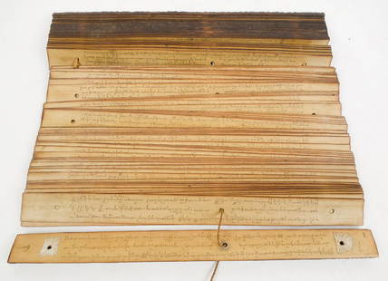 Indonesian Carved Wood Bound Lontar Palm Leaf Manuscript Book: This is an Indonesian carved wood bound book with engraved lontar palm leaf pages. These traditional books cover subjects of literature, mythology, history and religious works and are some of the