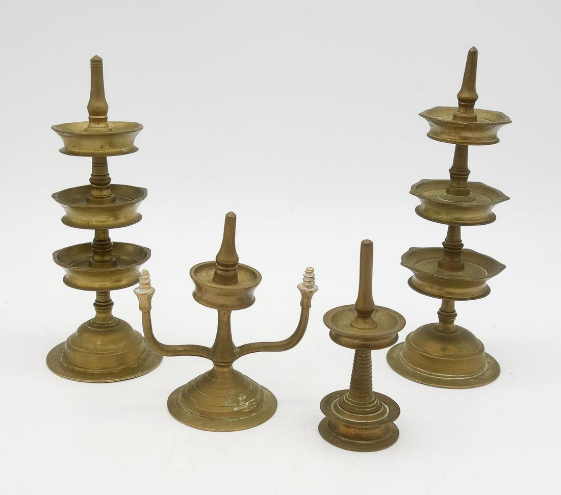 Antique Lot Indian Puja Religious Ritual Lamps: This is an antique lot of Indian religious ritual Puja lamps. These lamps represents illumination and enables the devotee to see the divine form of the lord easily. The tallest is 6"